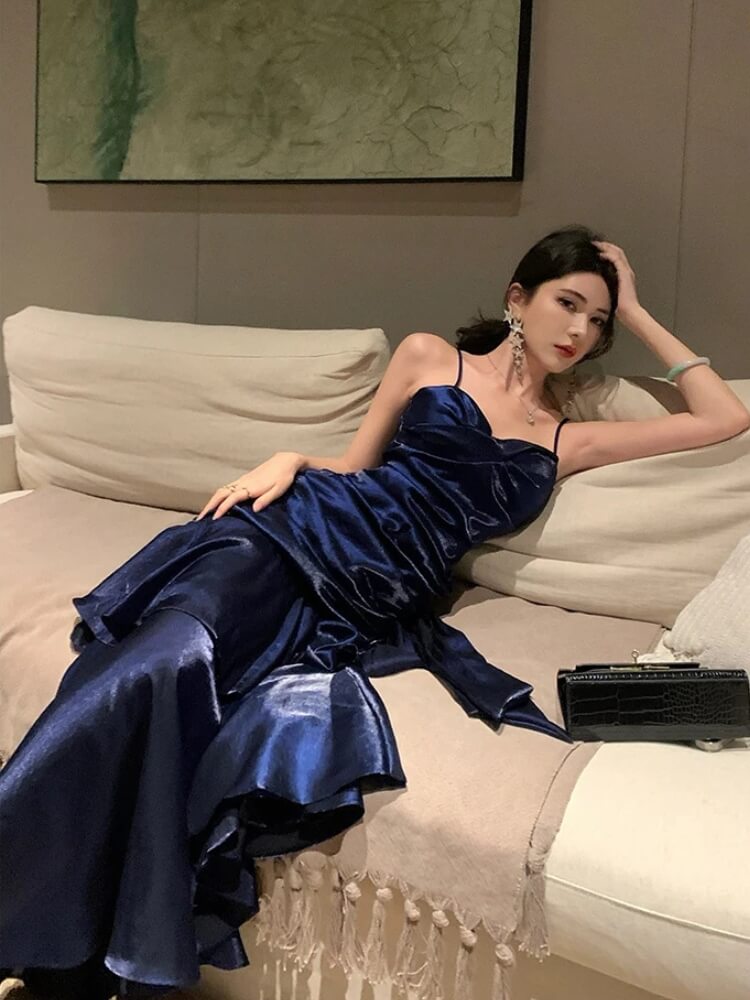 FJØRNA satin tiered women's maxi dress for evening and formal occasions, featuring flowing fabric and elegant design.