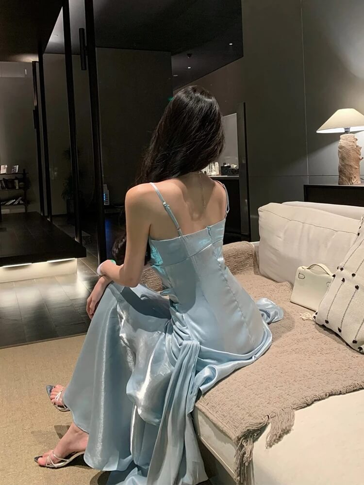 FJØRNA satin tiered maxi dress for women, elegant evening and formal wear with flowing layers and a sophisticated design.