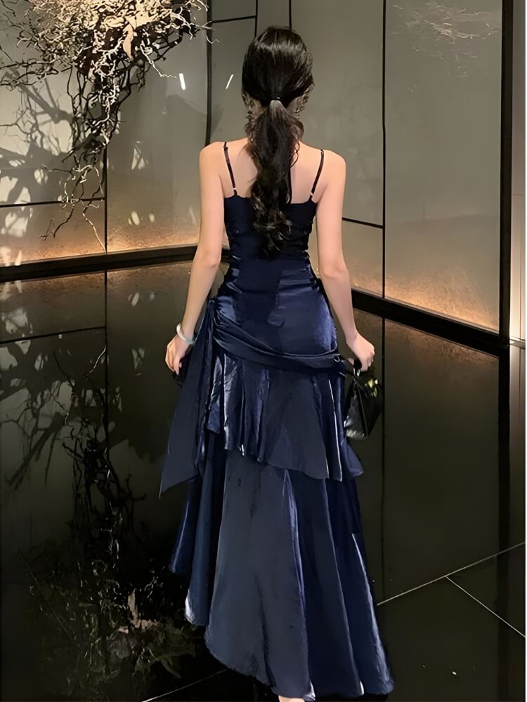 FJØRNA satin tiered women's maxi dress for evening and formal wear, showcasing a flowing, elegant design with tiered layers.