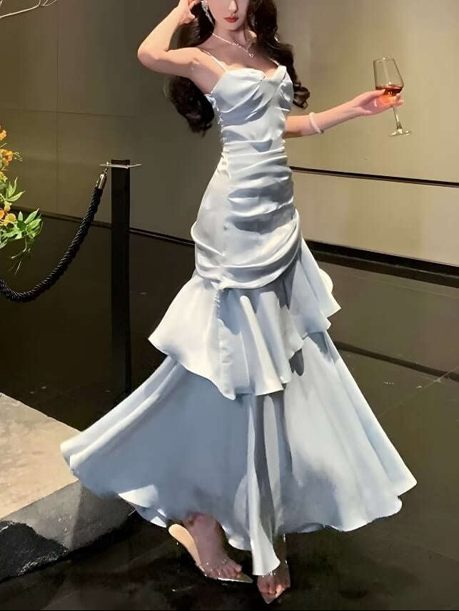 FJØRNA satin tiered maxi dress for women, elegant evening and formal wear with flowing fabric and layered design.