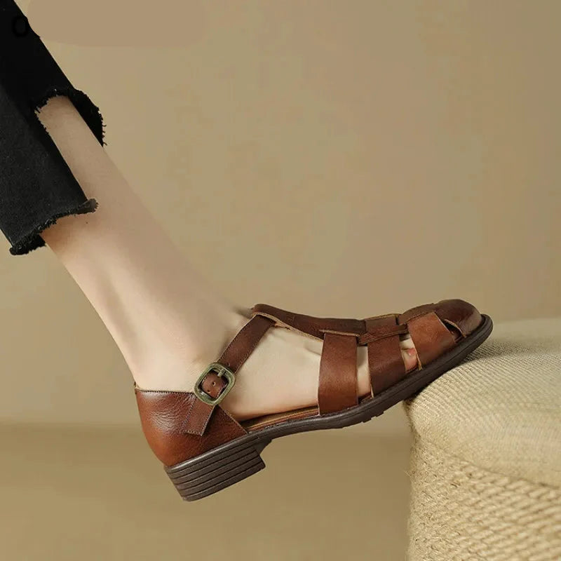 FJØRNA Italian leather women's sandals with adjustable straps, featuring a stylish open-toe design and comfortable flat sole