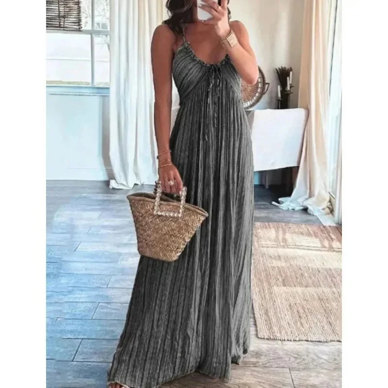 FJØRNA Renly sleeveless long white dress with a flowing silhouette, ideal for elegant summer or formal occasions.