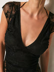FJØRNA Verde Lumière mesh blouse with long sleeves and flowy fit, featuring a lightweight, semi-transparent fabric.