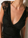 FJØRNA Verde Lumière mesh blouse shown in soft green with delicate sheer fabric and intricate design.