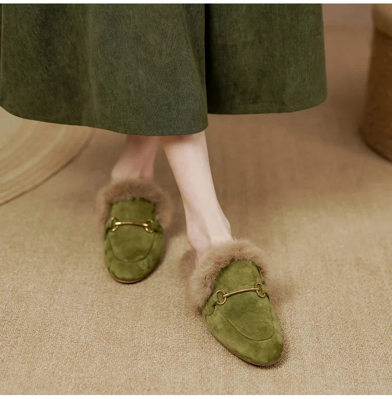 FJØRNA women's fur mule slippers with plush lining and slip-on design, showcasing a cozy, luxurious footwear style.