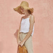 FJØRNA satin-trimmed linen cami top in light neutral color, featuring delicate satin accents and a relaxed fit.