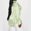 Women's satin blouse by FJØRNA, stylish top with smooth fabric and elegant design, perfect for dressing up or casual wear.