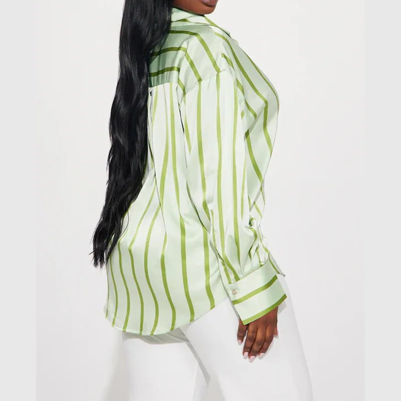 Women's satin blouse by FJØRNA, stylish top with smooth fabric and elegant design, perfect for dressing up or casual wear.