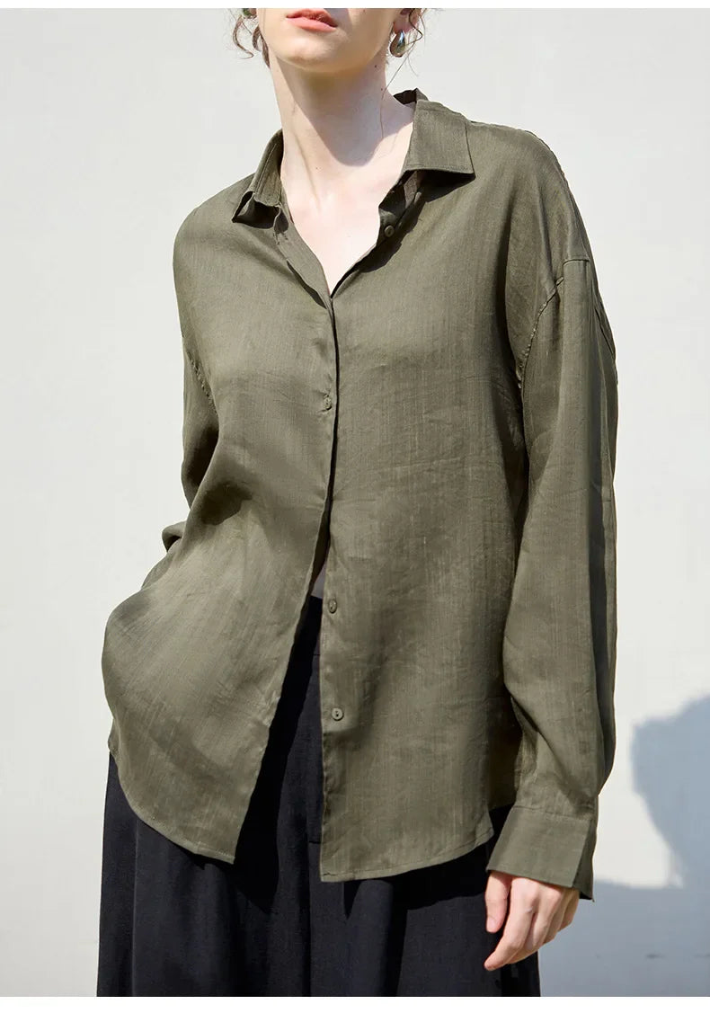 FJØRNA women's linen shirt, lightweight and breathable tops for women, featuring a relaxed fit and natural fabric texture.