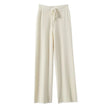 FJØRNA women's merino wool wide-leg high waist trousers, stylish and cozy pants showcasing a tailored fit and smooth fabric.