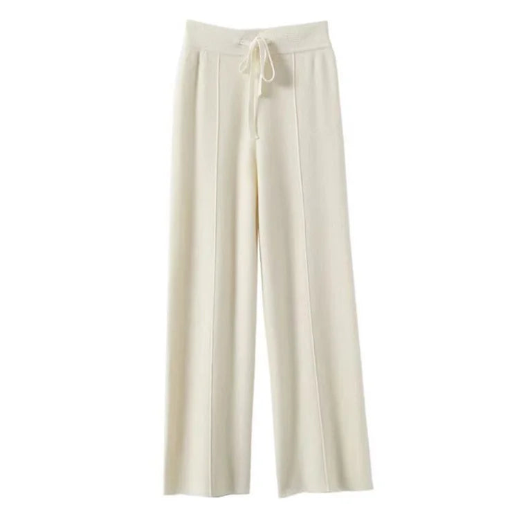 FJØRNA women's merino wool wide-leg high waist trousers, stylish and cozy pants showcasing a tailored fit and smooth fabric.