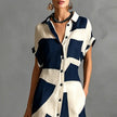 FJØRNA Victoria printed white maxi dress with button-down front and flowy fabric, perfect for casual or summer wear.