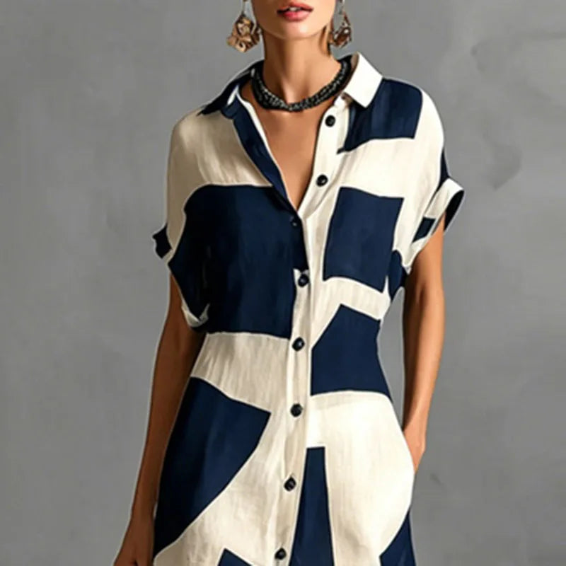 FJØRNA Victoria printed white maxi dress with button-down front and flowy fabric, perfect for casual or summer wear.