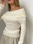 Women’s ribbed knit off-shoulder top by FJØRNA, featuring a fitted design with long sleeves and a stylish neckline.