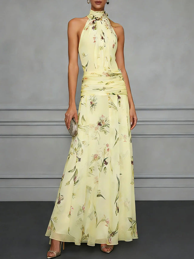 FJØRNA Jasmine floral halter wedding guest dress with a flowy silhouette and delicate floral print, perfect for special occasions.