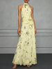 Jasmine floral halter wedding guest dress by FJØRNA with a flowy silhouette and floral pattern, perfect for summer events.