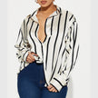 FJØRNA satin blouse for women, stylish women's tops with smooth fabric and elegant design, shown in a close-up image.