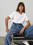 FJØRNA women's cotton T-shirt, casual top in soft white fabric, short sleeves, and comfortable fit.