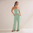 FJØRNA women's knit wide-leg trousers in a co-ord set, featuring relaxed fit and soft knit fabric, styled on a model.