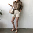FJØRNA women's linen shirt with open collar, lightweight and breathable top, stylish women's blouse for casual or professional wear.