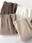 FJØRNA women's jogger pants, comfortable casual pants with elastic waistband and tapered fit, in soft fabric.