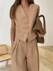 FJØRNA women's linen wide-leg trousers, part of co-ord set, shown in natural fabric and relaxed fit style.