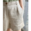 FJØRNA women's high waist linen shorts with a relaxed fit and light fabric, ideal for warm weather and casual outings.