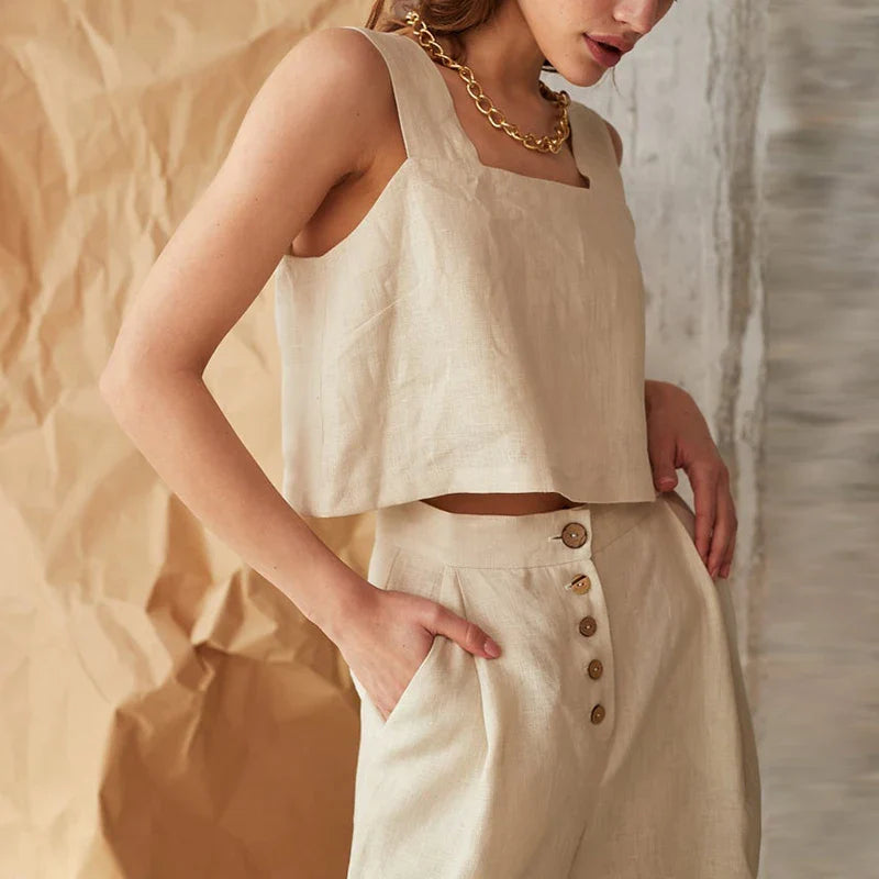 FJØRNA square neck linen cropped tank top displayed on a model, showcasing its stylish square neckline and lightweight fabric