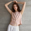 FJØRNA women's linen crop top, lightweight and breathable, shown in a natural stance, featuring short sleeves and a relaxed fit.
