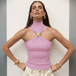 FJØRNA women's silk halter neck top, elegant and smooth, showcasing the soft fabric and stylish design in a close-up view.