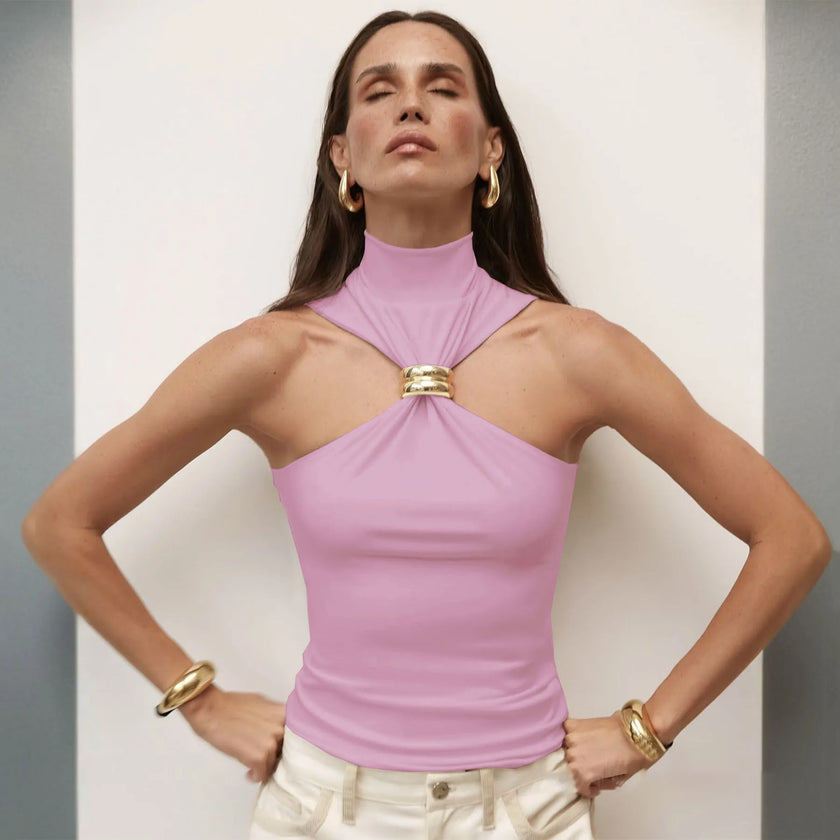 FJØRNA women's silk halter neck top, elegant and smooth, showcasing the soft fabric and stylish design in a close-up view.