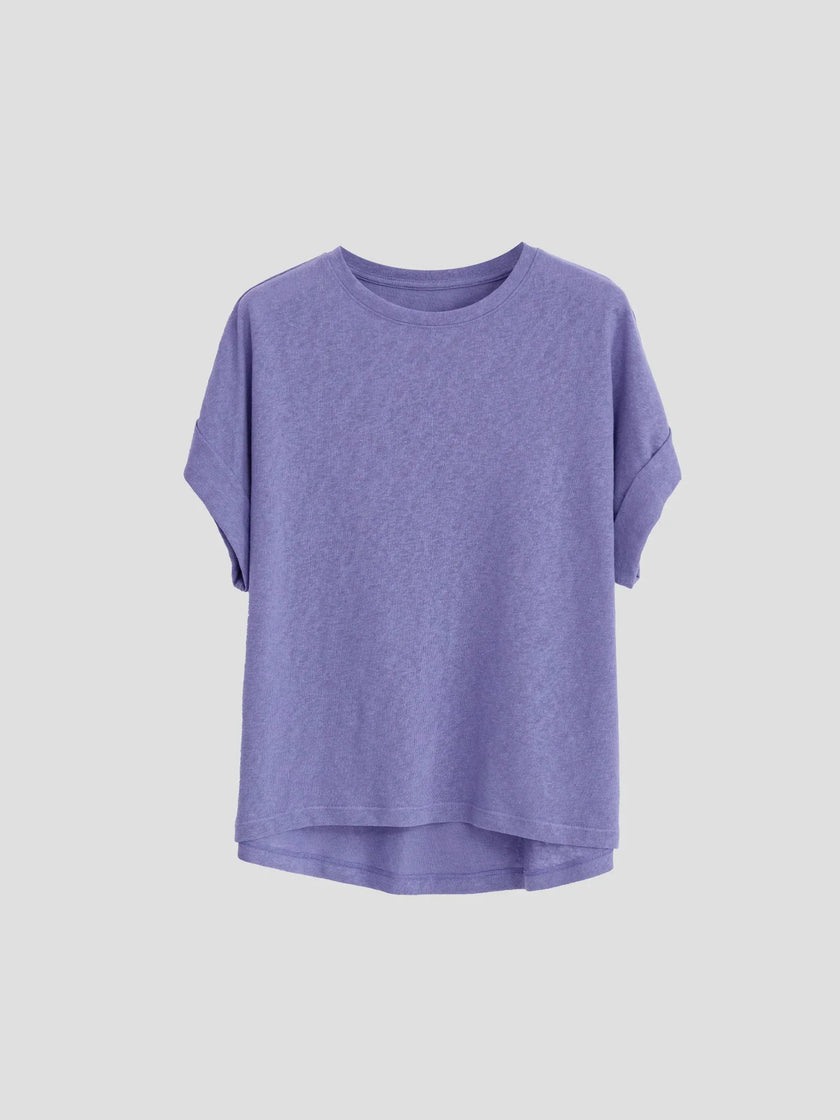 FJØRNA oversized tee with rolled cuffs, soft fabric, relaxed fit, and casual style, shown on a model.