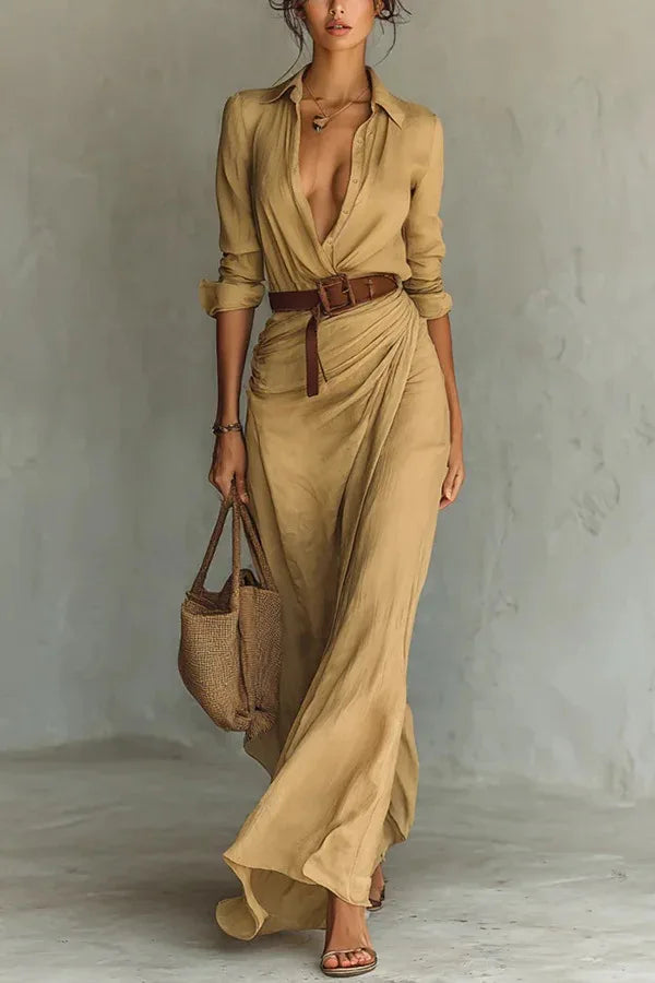 FJØRNA Anderson White Wrap Maxi Dress displayed on a model, featuring flowing fabric and elegant design for versatile summer wear.