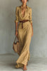 FJØRNA Anderson White Wrap Maxi Dress displayed on a model, featuring flowing fabric and elegant design for versatile summer wear.