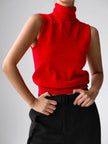 FJØRNA women's sleeveless wool vest, cozy and stylish top, shown in a close-up image highlighting the textured fabric and fit