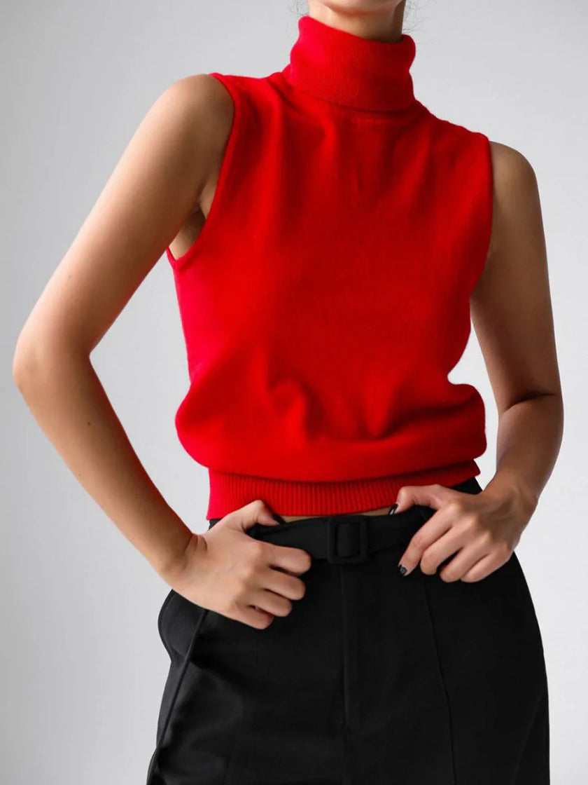 FJØRNA women's sleeveless wool vest, cozy and stylish top, shown in a close-up image highlighting the textured fabric and fit