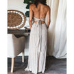 FJØRNA Renly white sleeveless long dress with a flowing silhouette, perfect for elegant occasions or summer wear.
