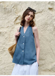 FJØRNA linen waistcoat for women with halter neck and sleeveless design, stylish top perfect for summer wear.