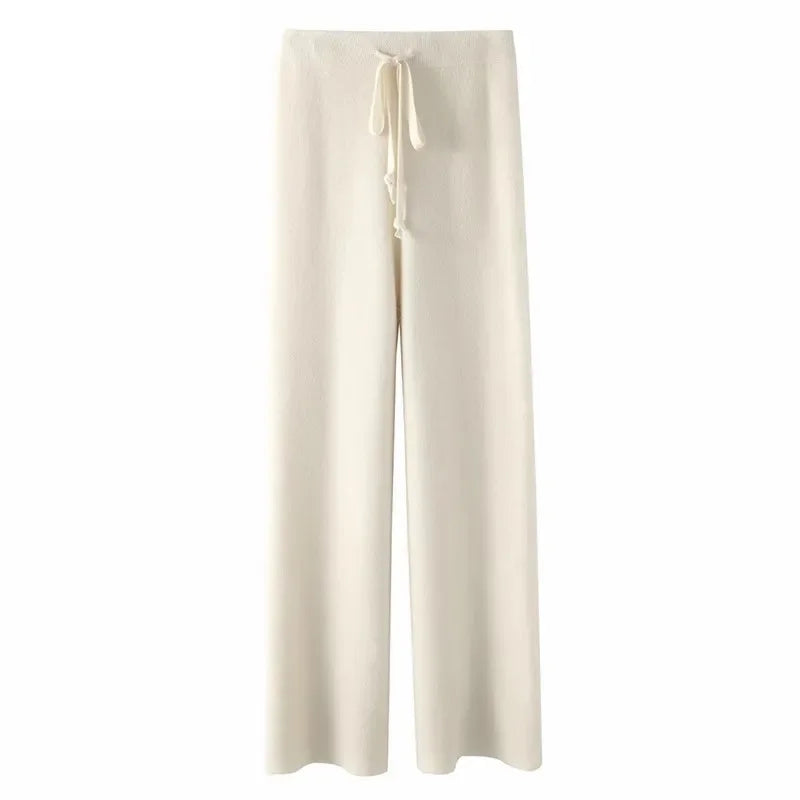 FJØRNA women's joggers, stylish pants with a comfortable fit, shown in a relaxed pose on a neutral background