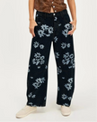 Women’s wide-leg denim jeans by FJØRNA, showcasing classic blue pants with a relaxed fit and high waist style.