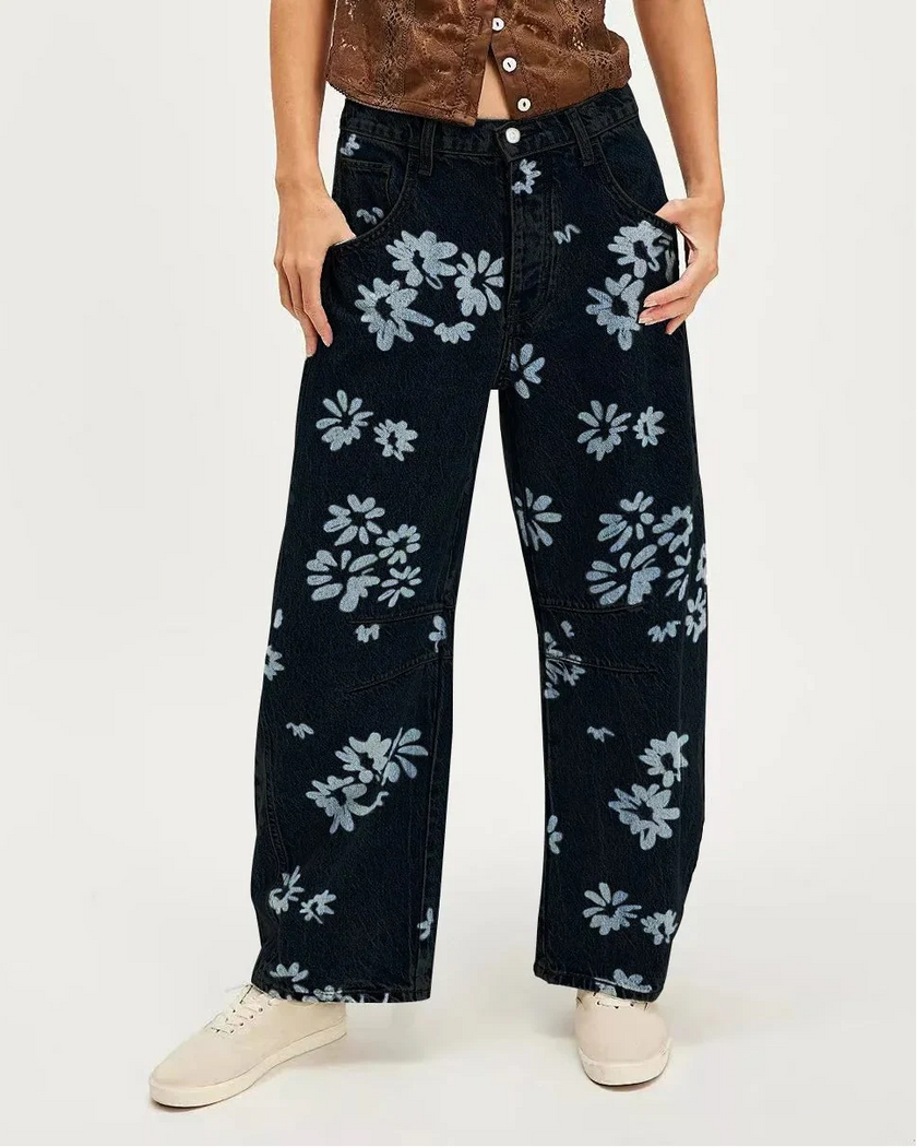 Women’s wide-leg denim jeans by FJØRNA, showcasing classic blue pants with a relaxed fit and high waist style.