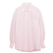 FJØRNA women's long sleeve linen blouse, lightweight and airy top with a relaxed fit, shown in natural fabric texture.