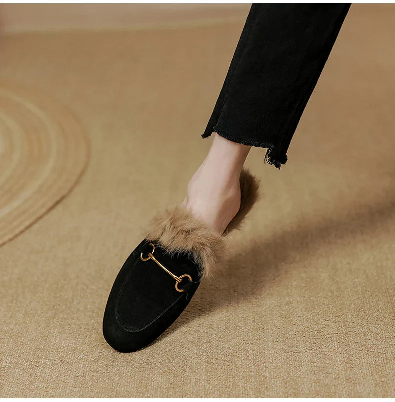 FJØRNA women's plush fur mule slippers with slip-on design and luxurious lining, perfect for cozy indoor wear.