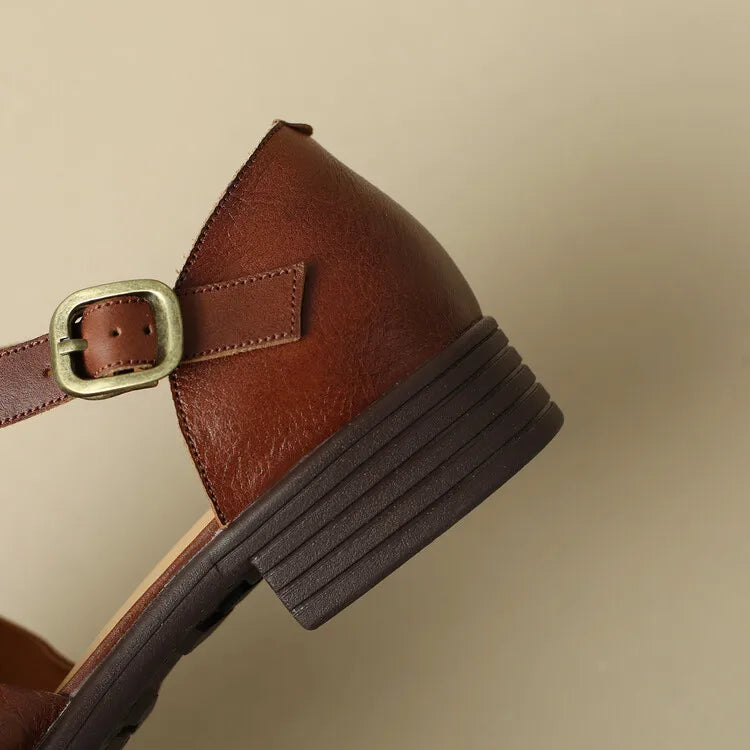 FJØRNA women's Italian leather sandals with adjustable straps, featuring a stylish open-toe design and comfortable flat sole.