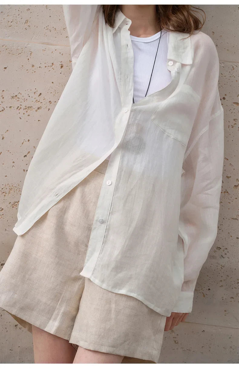 FJØRNA women's linen shirt, light and breathable tops for women, featuring a relaxed fit and natural fabric texture.
