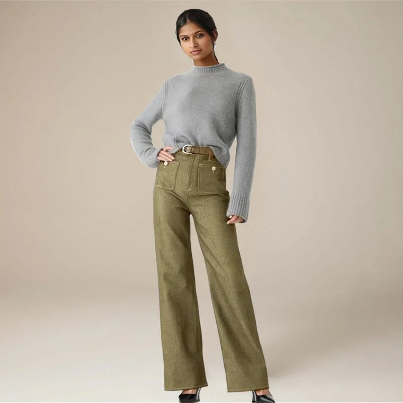 Women’s wide-leg cotton jeans by FJØRNA with high waist and relaxed fit, shown in a front view on a neutral background.