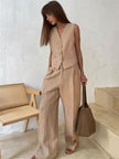 FJØRNA women's linen wide-leg trousers, stylish and comfortable pants for women, part of a co-ord set, shown in neutral fabric.
