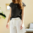 FJØRNA Petal Sleeve Linen T-Shirt in light fabric with elegant petal sleeves, casual and breathable for warm weather.