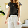 FJØRNA Petal Sleeve Linen T-Shirt in light fabric with elegant petal sleeves, casual and breathable for warm weather.