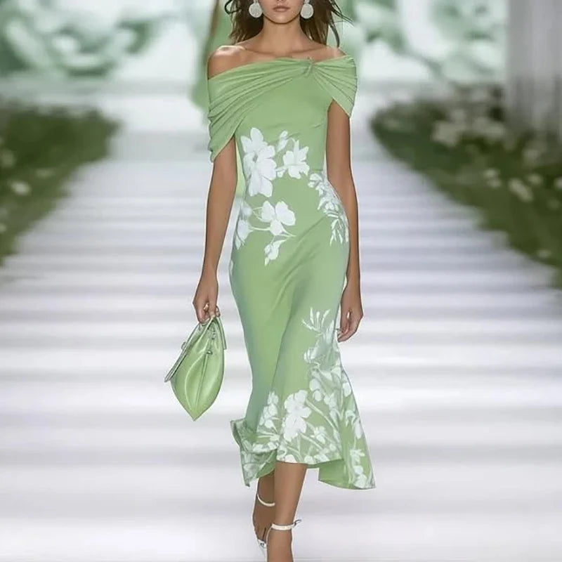 FJØRNA fitted off-shoulder mermaid midi dress with draped neckline and floral pattern, showcasing elegant design and form-fitting style.